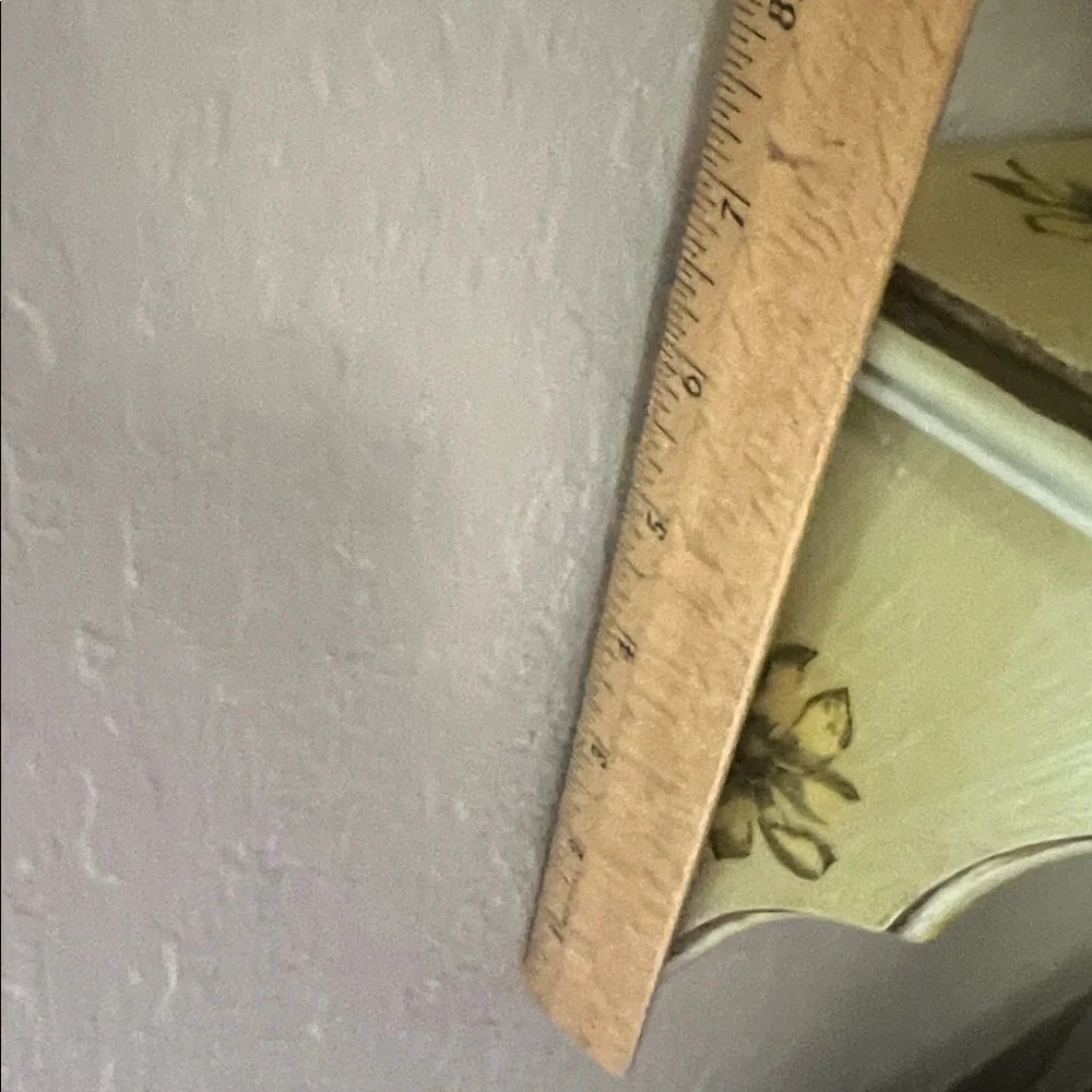 Vintage Charming Beige Wall Shelf with Floral Accents